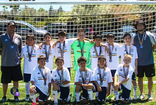 EC Revolution U11 Boys Blue with Creek Cup finalist medals, photographed by @that_soccer_mom_pride